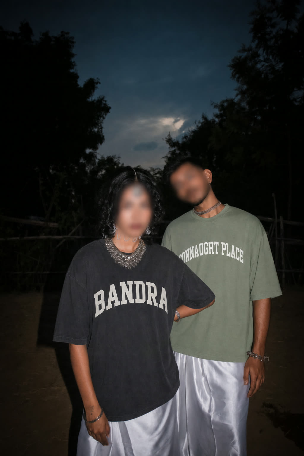 Two people wearing the Bandra and Connaught Place tees