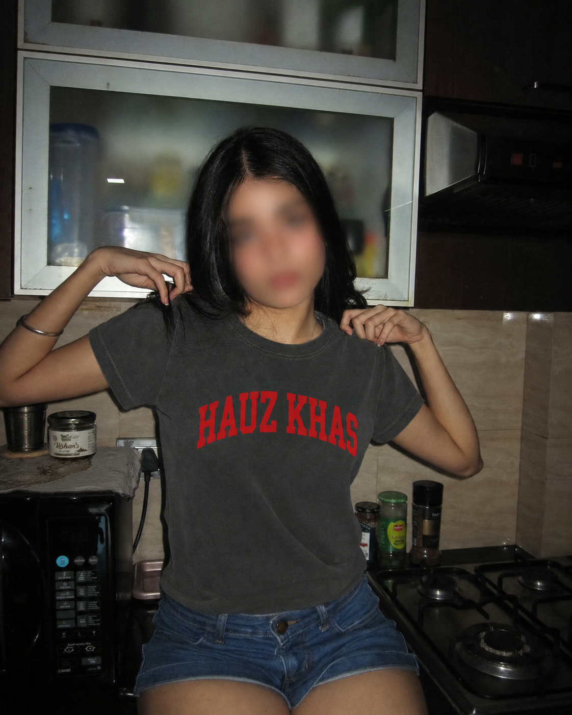 A late-night kitchen scene in the Hauz Khas tee