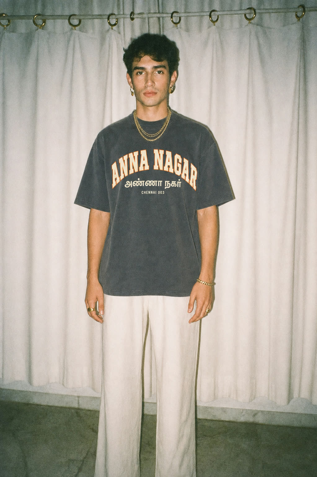 A flash-lit portrait in the Anna Nagar tee