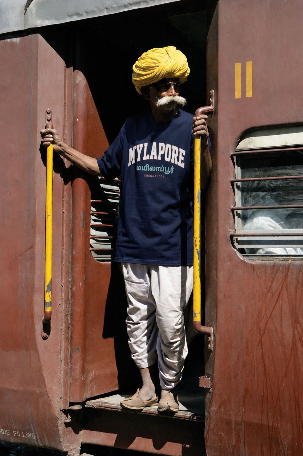 Commuters on the Mylapore local line in APSHABD tees